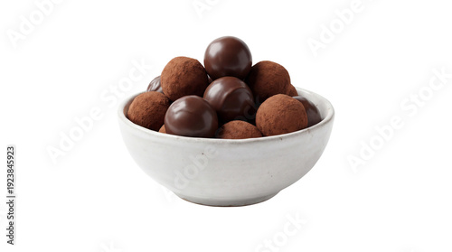 White bowl filled with dark chocolate truffles, some smooth and some coated in cocoa powder isolated PNG with Transparent Background