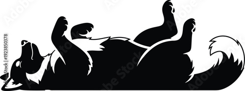 Happy dog playful pet resting. Fluffy dog lying down with one paws raised.