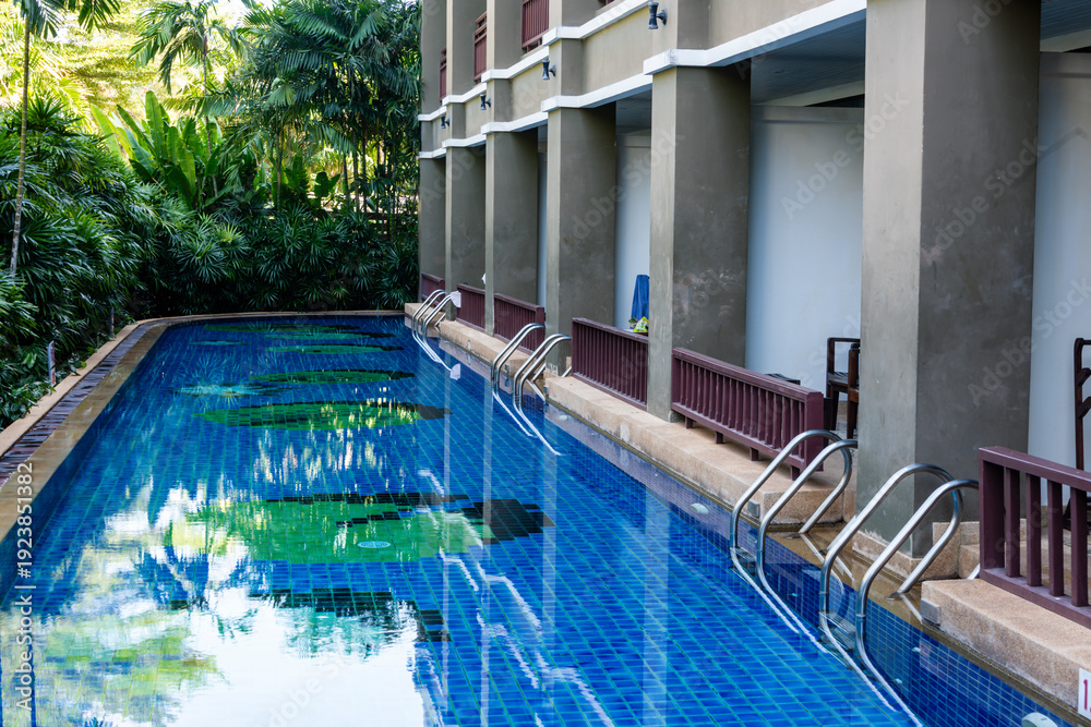 Obraz premium Swimming pool with private balconies with direct access to a private swimming pool