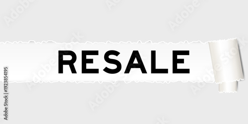 Ripped gray paper background that have word resale under torn part