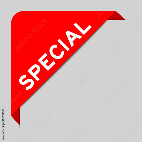 Red color of corner label banner with word special on gray background