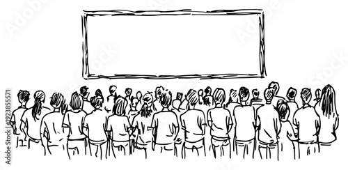 Large audience seen from behind looking at a blank projection screen in a hall