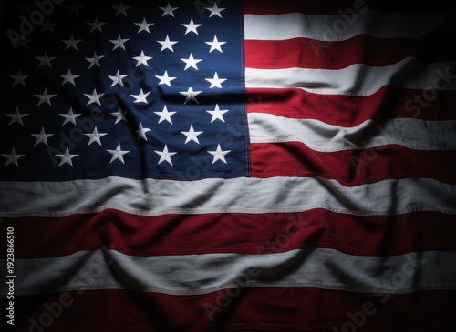 American flag background with dramatic lighting, crumpled fabric of the United States flag, patriotic texture for Memorial Day and Veterans Day