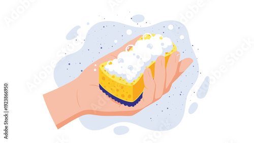 Human hand holding a bright yellow cleaning sponge covered with thick white soap bubbles on a blue background.