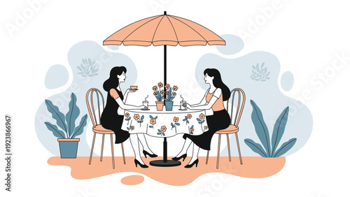 Two female friends enjoying a friendly conversation and coffee sitting at a round table in an outdoor cafe garden.