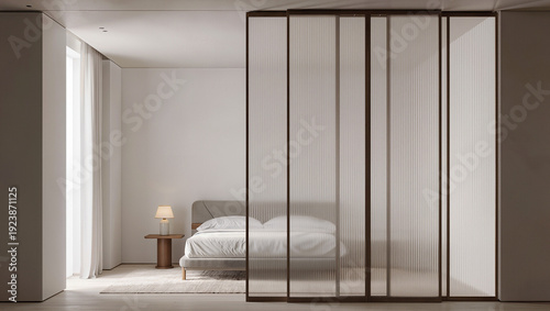 A minimalist bedroom with a bed wooden nightstand and lamp partially visible through translucent fluted glass sliding partitions featuring white walls and a large window