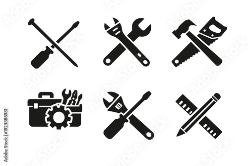 Handyman tools glyph icons: screwdriver with nail, adjustable wrench, hammer and saw, toolbox with gear, crossed spanner and driver, plus pencil and ruler for design and drafting.
