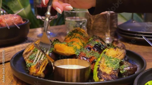 prick a piece of pumpkin with a fork Grilled vegetables platter