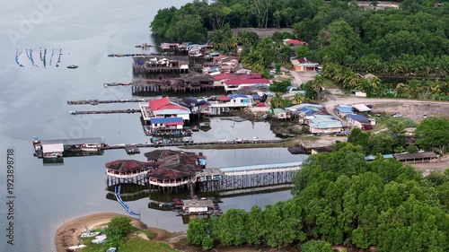 Aerial glimpse shows Kampung Sungai Temun with floating seafood restaurant