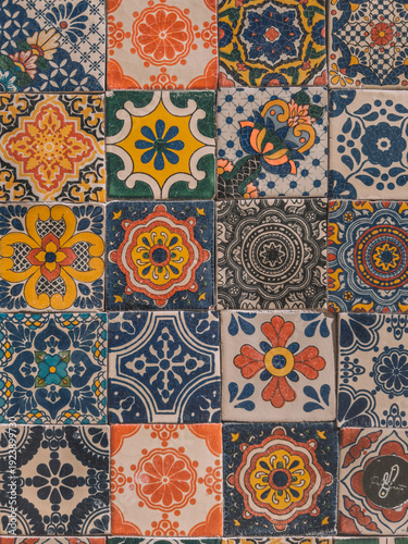 Traditional colorful Mexican ceramic tile pattern background in Holbox, Mexico.