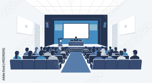 Audience attentively watching a presentation on a large screen in a modern conference hall.