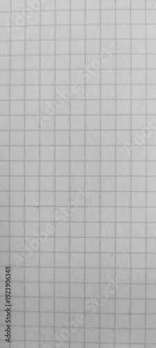 White squared paper texture background, notebook grid pattern close up