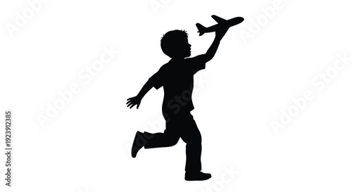 A child playfully runs with a toy airplane in black silhouette