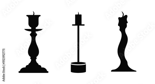 Three black candlesticks displayed in a simple elegant silhouette