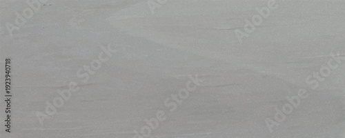 grayy rustic texture. Retro whitewashed surface of the old wall. Ancient structures. Grungy worn uneven painted plaster. Whiten the facade background