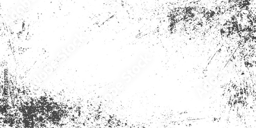 Abstract grunge white and black texture with scratches cracks and distressed monochrome surface rough damaged background pattern.