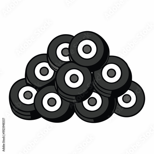A towering pile of black wheels stacked haphazardly, their shiny surfaces catching light, hinting at motion paused, waiting for roads and journeys ahead.
