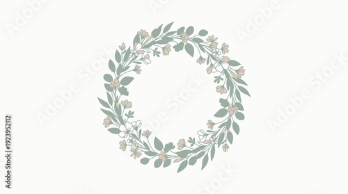 A delicate circular wreath composed of soft green leaves and small, light-colored flowers, set against a plain, off-white background.