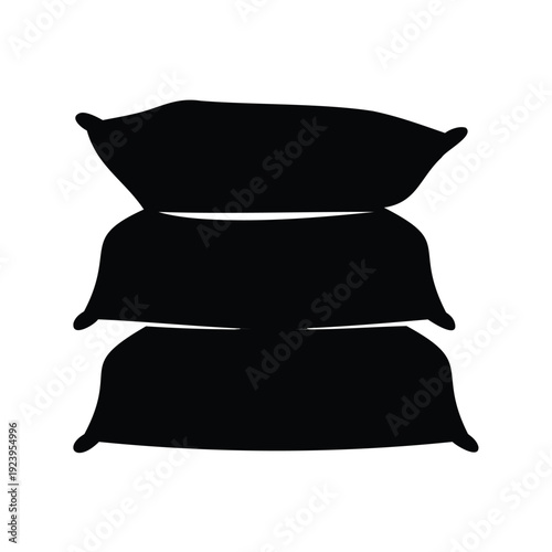 Monochrome stack of three soft pillows silhouetted against a white background