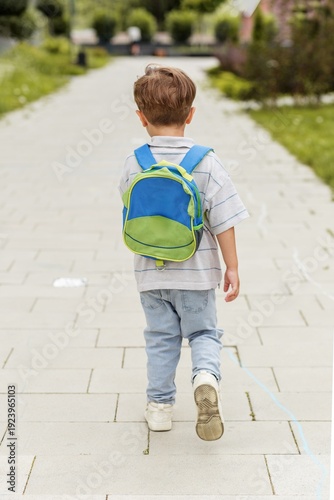 Little Boy Walking to School Alone