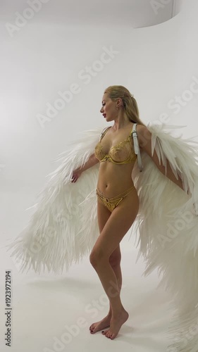 Blonde Angel Posing in Gold Lingerie