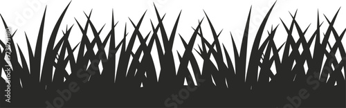 Stylized silhouette of sharp, angular blades of grass forming a dense horizontal border against a stark white background, representing nature's texture