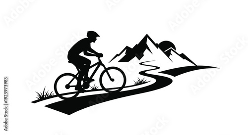 Cyclist riding a mountain bike on a winding road a striking silhouette