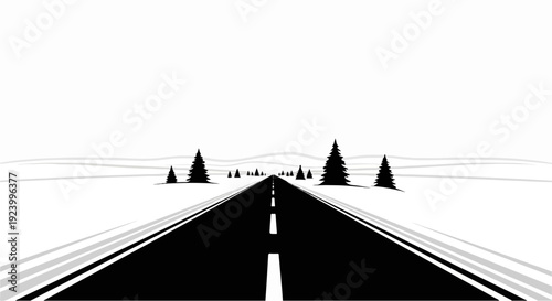 Straight road vanishing into distance with trees in winter landscape