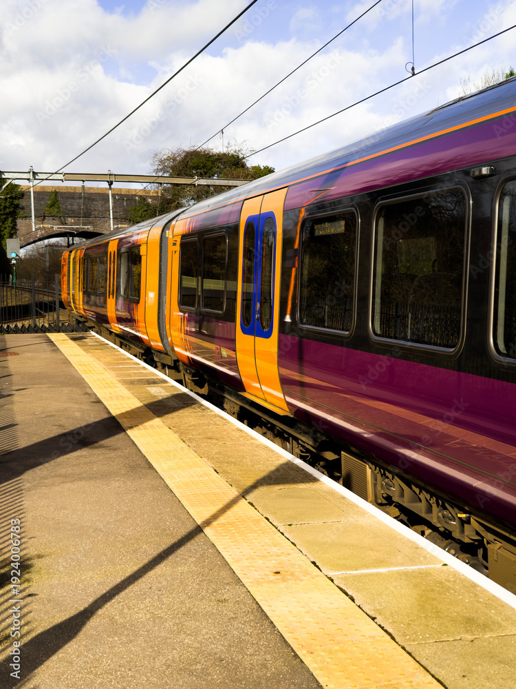 Obraz premium british rail suburban commuter passenger railway station. Great British Railways.