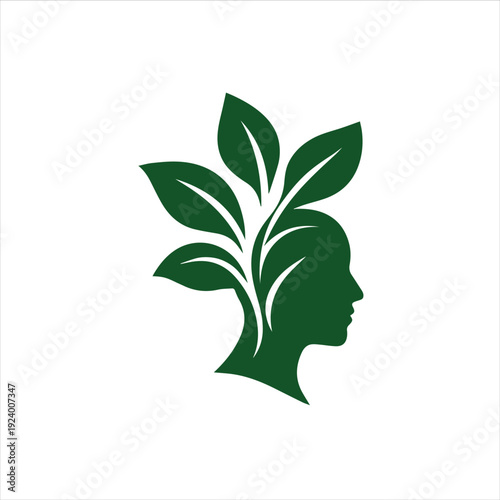 Dark green silhouette of a human head with leaves growing out of it on a white background
