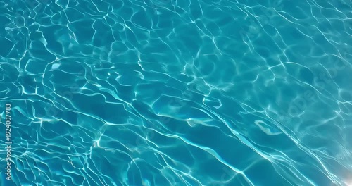 Blue swimming pool water surface rippling with bright sunlight reflections, clean abstract summer background, cinematic 4K video footage