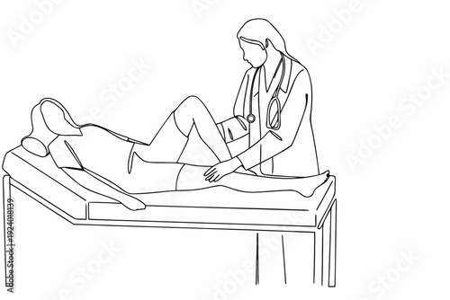 A doctor examines a pregnant patient lying on an examination table