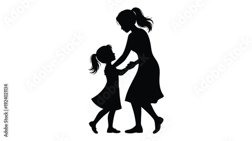 Silhouette of a woman and a little girl holding hands walking together in black