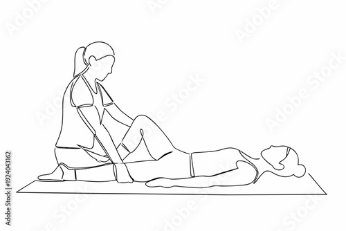 Woman performing a hamstring stretch exercise on a yoga mat