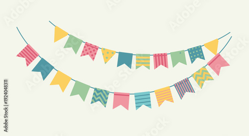 Colorful party flags hanging on a string, perfect for festive decoration and celebrations.