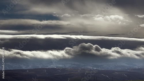 Cyclone anticyclone patterns force high pressure airflow, shaping storm clouds across continents. Rotating lows plus stable highs steer vast wind fields, moving layered overcast above oceans.
