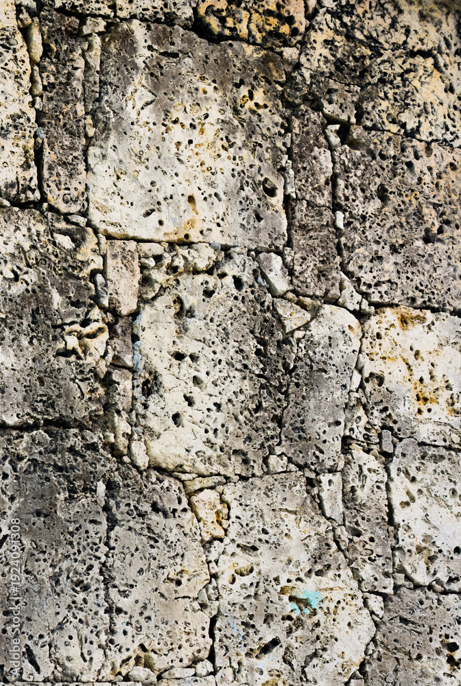 Obraz premium Weathered Stone Wall Texture Background