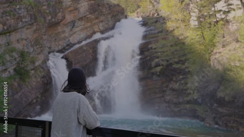 Wallpaper Mural Woman enjoys the scenic beauty of Cameron Falls in Waterton Lakes National Park Torontodigital.ca