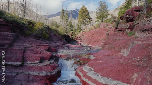 Wallpaper Mural Red Rock Canyon waterfall flowing through argillite in Waterton Lakes National Park Torontodigital.ca