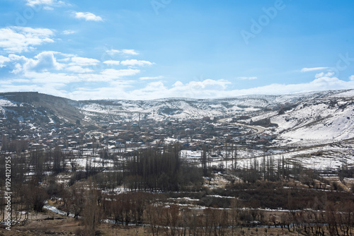 Wallpaper Mural Panoramic landscape view across rural countryside valley during winter in Cappadocia Central Anatolia Turkey with geological fairy chimney rock formations and snow Torontodigital.ca