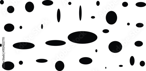 A collection of variously sized black spots on a white background