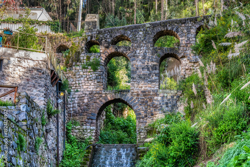 Wallpaper Mural Vibrant view with the historic Sapantiana Aqueduct (Acueducto de Sapantiana) in Cusco, Peru Torontodigital.ca