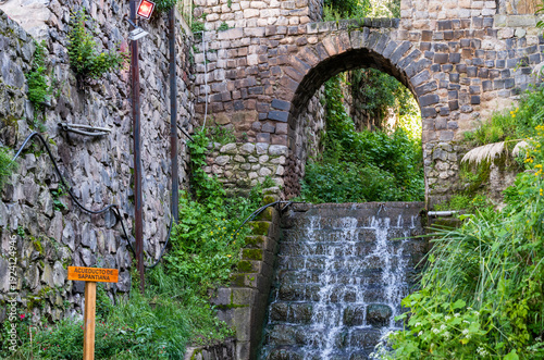 Wallpaper Mural Vibrant view with the historic Sapantiana Aqueduct (Acueducto de Sapantiana) in Cusco, Peru Torontodigital.ca