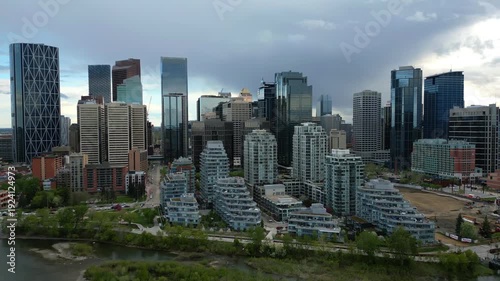 Wallpaper Mural Calgary skyline panoramic view showing modern skyscrapers and residential buildings along Bow River Torontodigital.ca