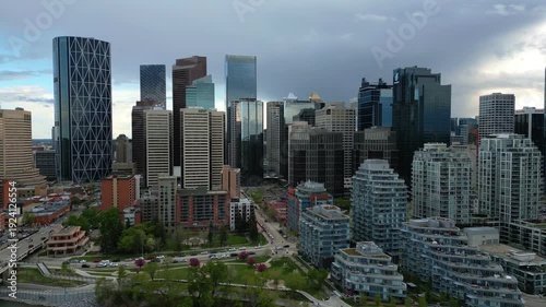 Wallpaper Mural Calgary skyline panoramic view showing modern skyscrapers and residential buildings along Bow River Torontodigital.ca