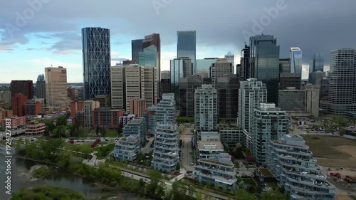 Wallpaper Mural Calgary skyline panoramic view showing modern skyscrapers and residential buildings along Bow River Torontodigital.ca