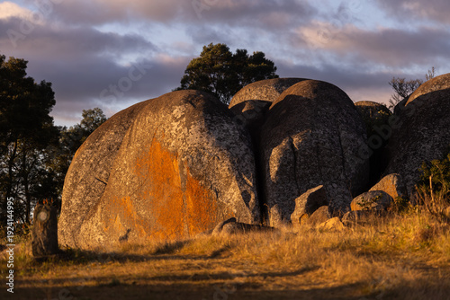 Konstfotografi Large granitic boulder in the golden light of the late afternoon light in Malolotja Nature Reserve, Eswatini