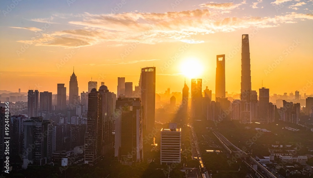 Fototapeta premium Cityscape at Sunrise Featuring Modern Architecture and Golden Light Illuminating the Skyline.