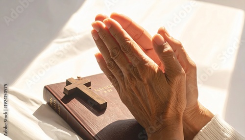 Hands Praying Over Bible with Cross, Christian Prayer and Faith Concept, Spiritual Worship and Devotion Background, Religious Lifestyle Image