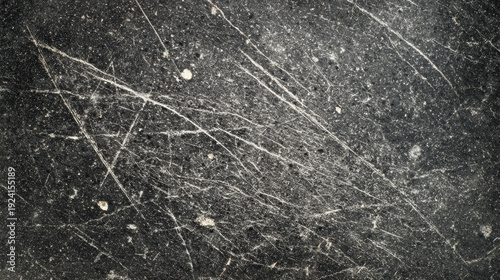 Abstract dark grunge texture background with heavy scratch marks. distressed and old worn surface showing detail of damage and pattern. dirty black backdrop concept of age